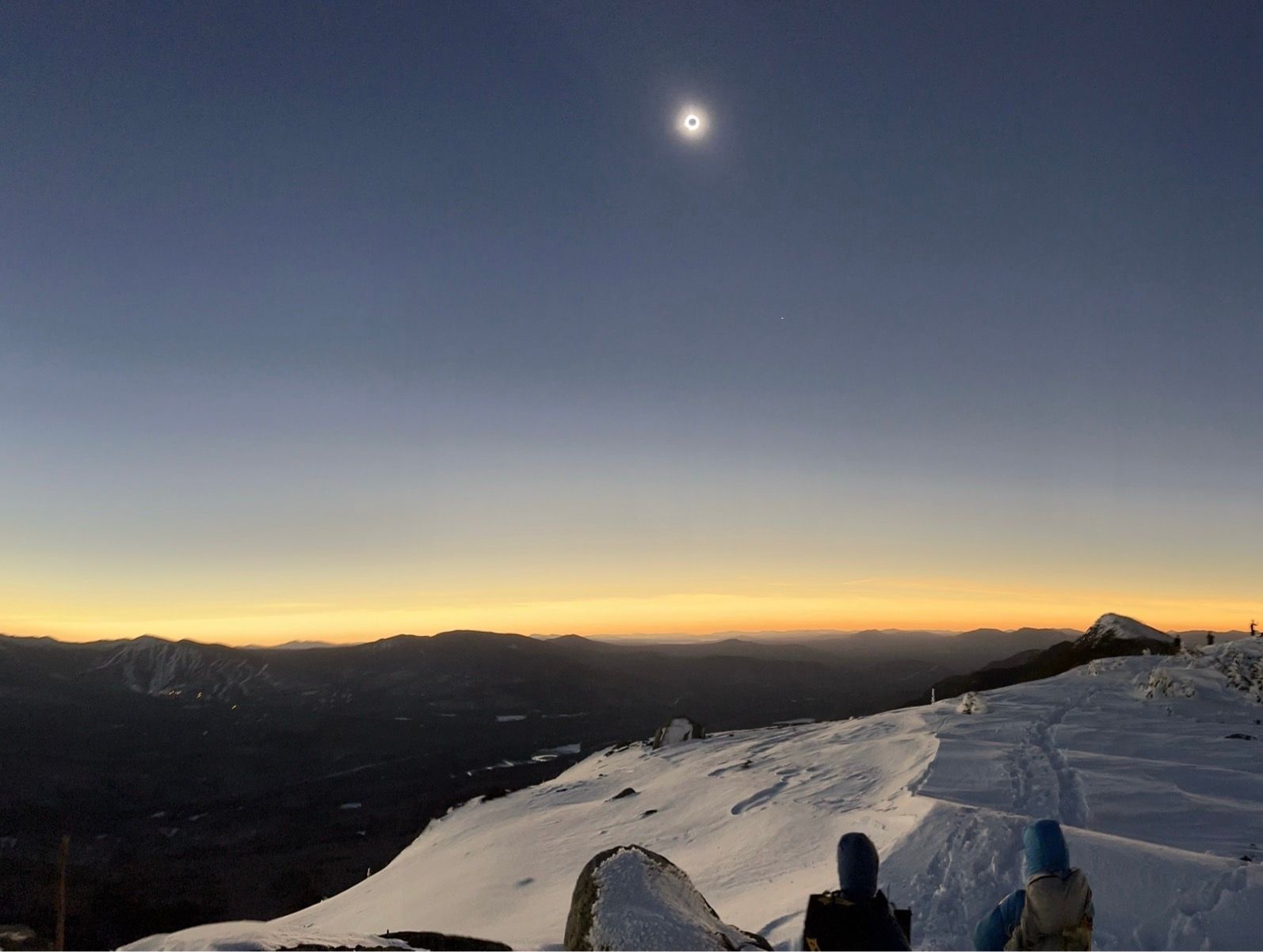 solar eclipse from a mountain top